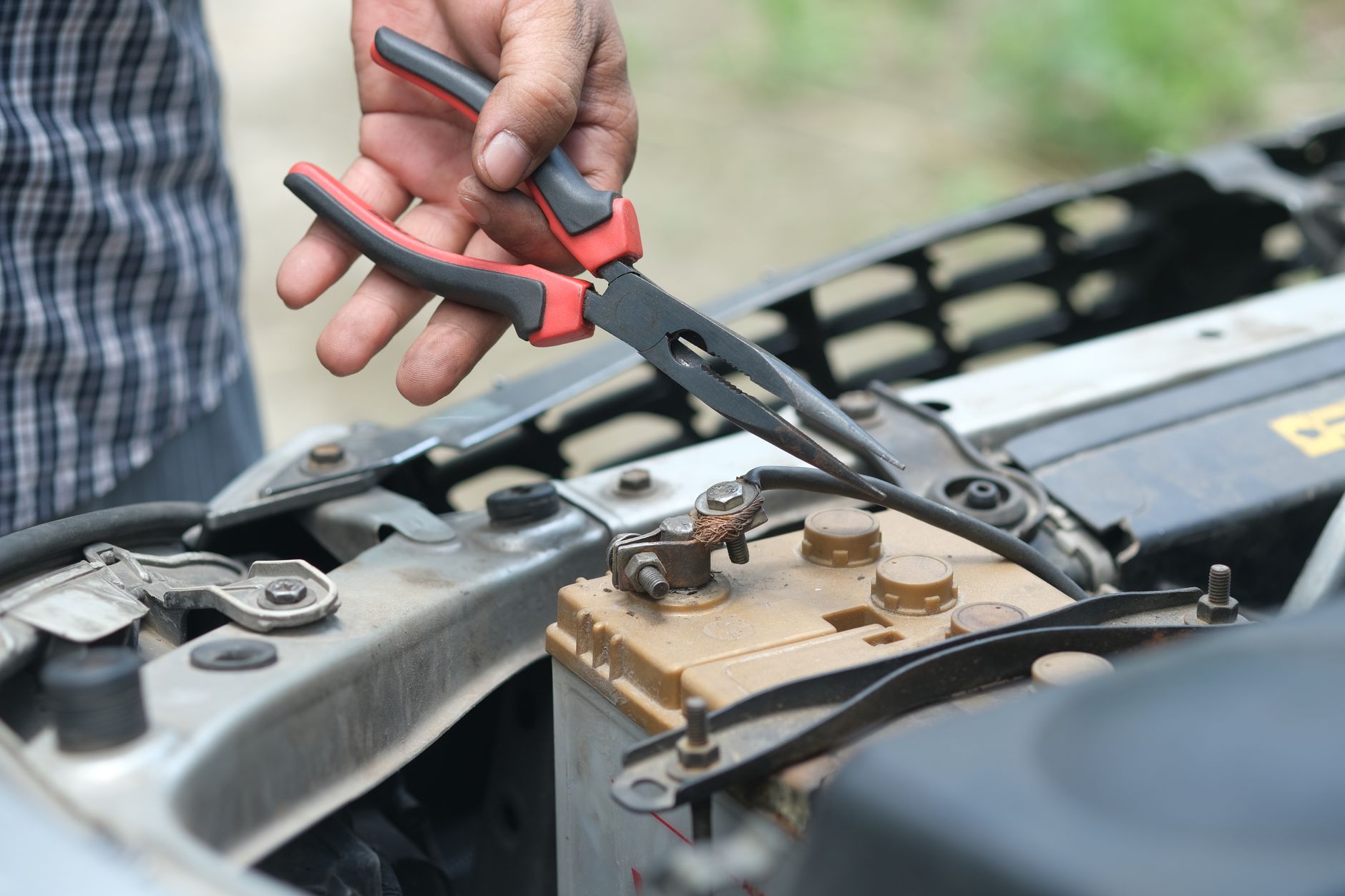 HVAC technician performing maintenance in Winston-Salem, NC